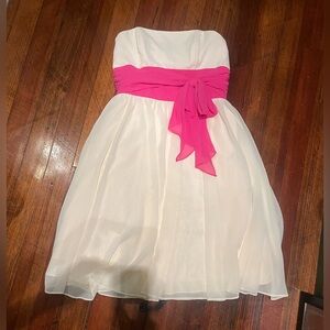 Alfred Angelo soft yellow with pink sash/bow strapless